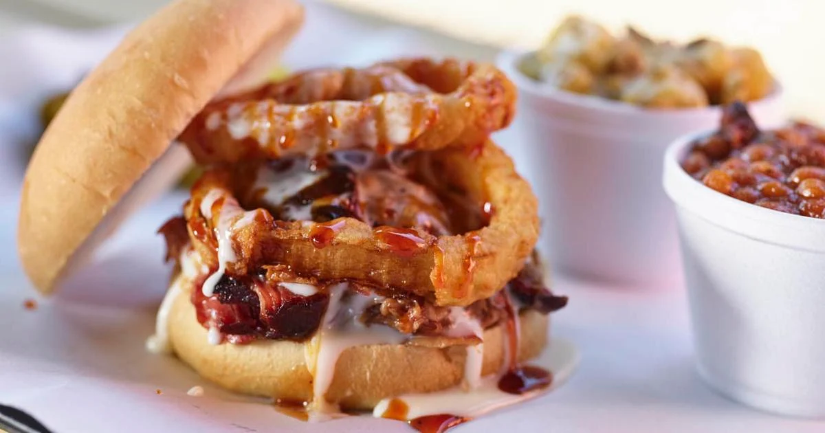 Slap's BBQ signature dishes The Mike Johnson, The Sandwich, Burnt Ends.
